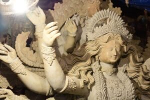 Durga idol sculpture showcases exquisite craftsmanship at the festival.