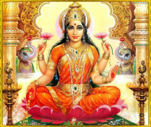 Goddess Lakshmi in orange attire, seated with lotus flowers, symbolizing wealth and prosperity.
