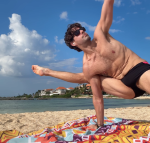 vasistasana on the beach